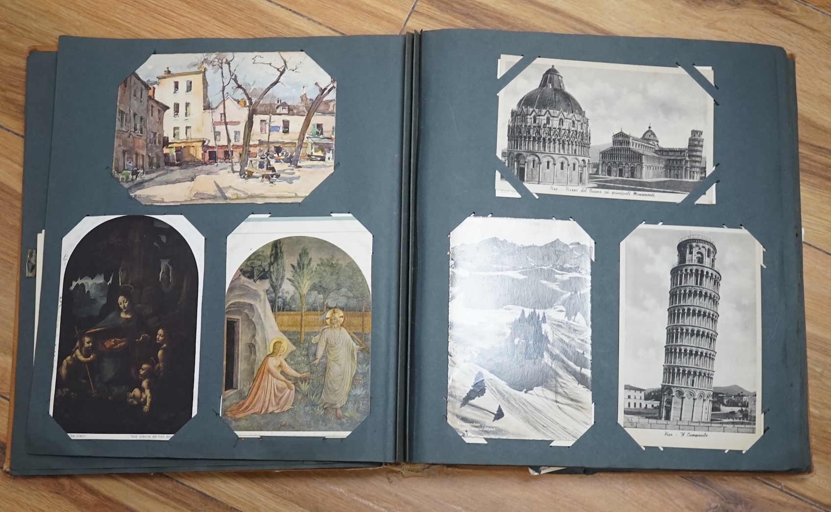 Two postcard albums, mostly topographical and other ephemera to include some black and white photographs. Condition - fair